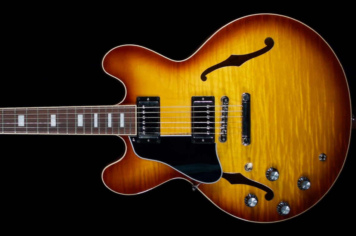 Gibson ES 335 Left-handed Guitar in figured top. Light burst