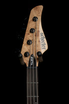 Guitar headstock with 'Schecter' branding on a black background